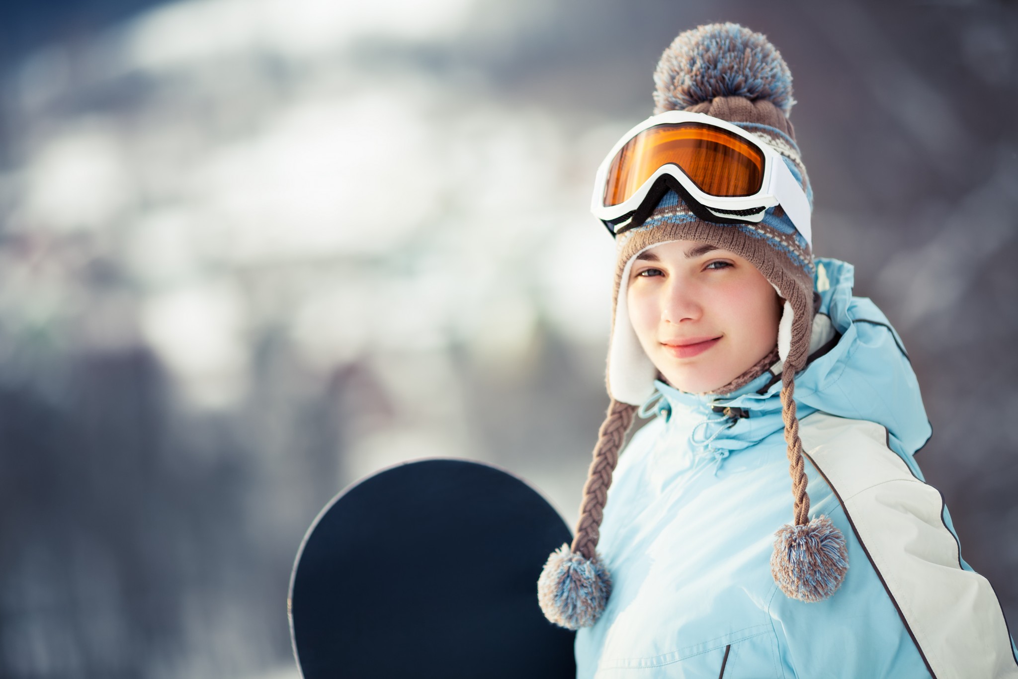 Pretty female snowboarder