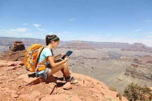 backpacker with gadget travelling