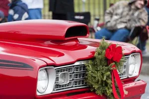 Classic Plymouth sporting wreath in Taunton Christmas Parade