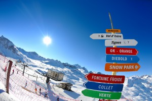 sign board at High mountains under fresh snow in the winter season