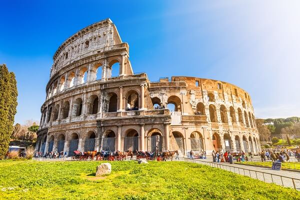 italy coliseum in the sunshine with blue sky