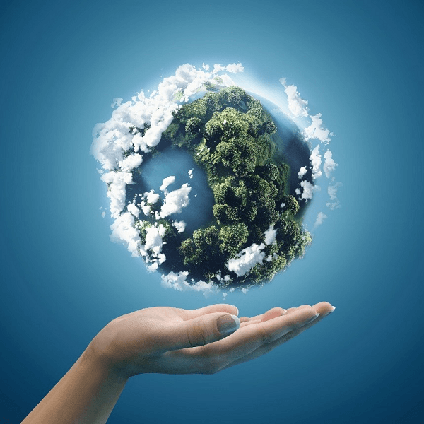 Sustainable Earth being held by a hand